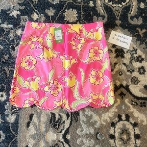 Lilly Pulitzer Lynnie Skirt in the "Hotty Pink Day Lilly" print.